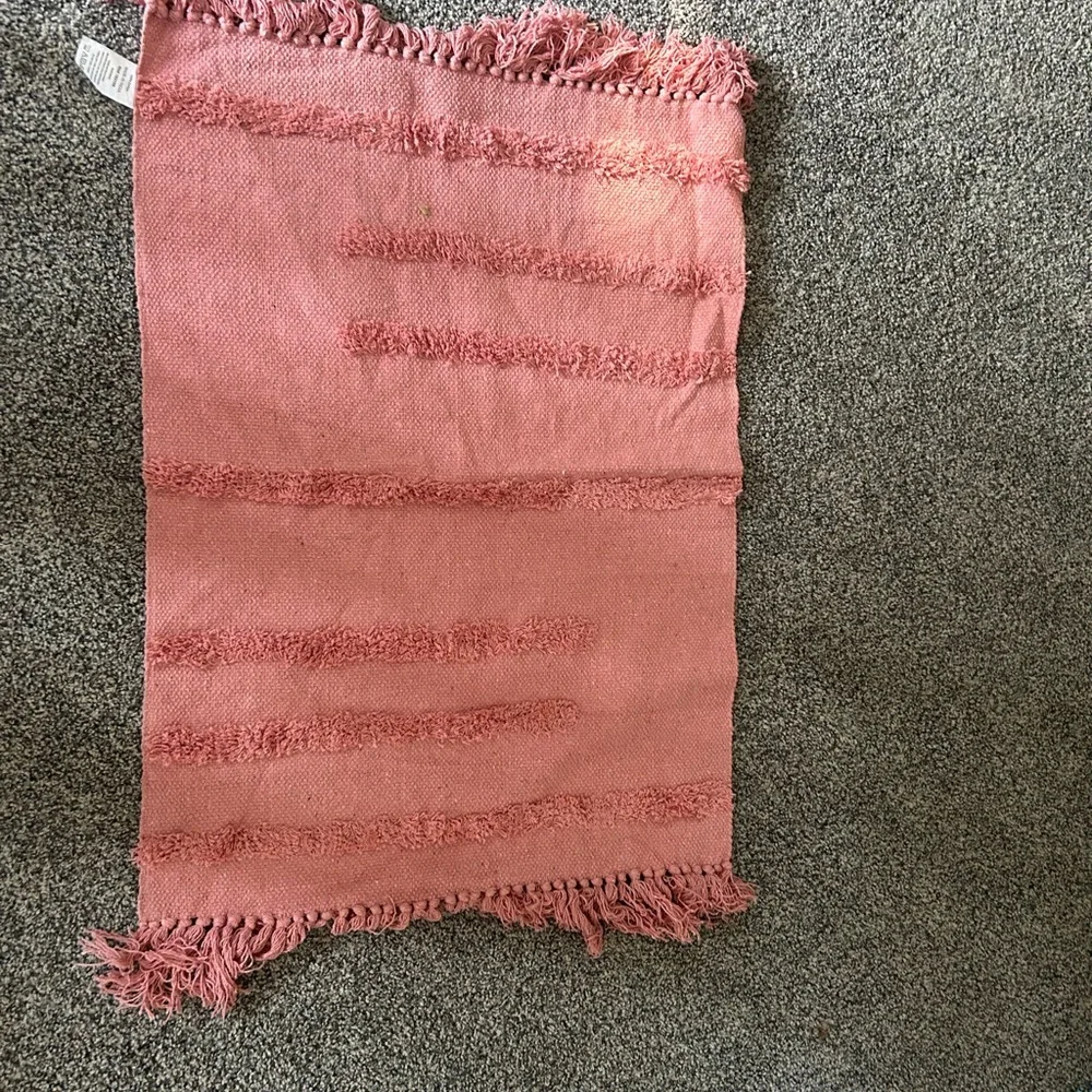 Pink bath mat